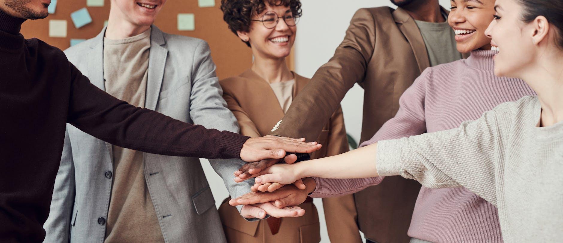 Team hands together